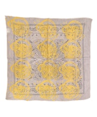 a yellow bandana with black and grey designs